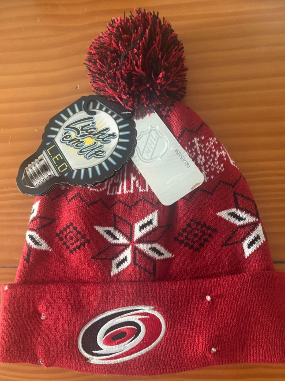 NHL Red and Black Pom Knit Beanie with Team Logo